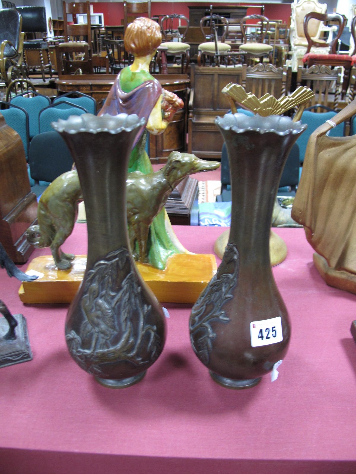 A Pair of Early XX Century Bronze Vases, of pear form, wavy rim, and cast decoration or cranes