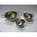 Hallmarked Silver Cream Jug and Sugar Bowl, each of inverted baluster form with scroll loop handles;