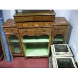 A XX Century Yew Wood Breakfronted Cabinet, with a crosbanded top, central drawer, two side