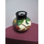 A Moorcroft Pottery Vase in the "Anna Lily" design by Nicola Slaney, shape 25/3, impressed and