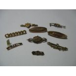 A Collection of Assorted Bar Brooches, including 'Mizpah', 'Baby' etc (damages). (9)