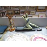 An Art Deco Painted Figure of a Reclining Lady, stamped "Nieribros", plus a Czech Art Deco vase.