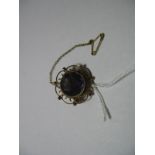 A 9ct Gold Amethyst Single Stone Brooch, circular collet set.