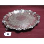 A Hallmarked Silver Salver, Goldsmiths & Silversmiths Co Ltd, of shaped circular form, with acanthus