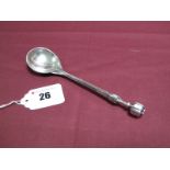 Omar Ramsden; A Hallmarked Silver Spoon, London 1930, with rounded bowl and poppy seed head