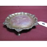 A Hallmarked Silver Card Tray, Messrs Hutton, Sheffield 1918, of shaped circular form with shell and