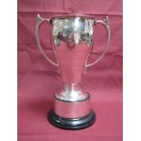 A Hallmarked Silver Twin Handled Trophy Cup, makers mark rubbed, of inverted baluster form,