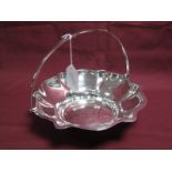 A Hallmarked Silver Swing Handled Dish, Cooper Bros, Sheffield 1926, of shaped circular form, with