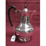 A Hallmarked Silver Coffee Pot, Thomas Levesley, Sheffield 1915, of plain baluster form, with leaf