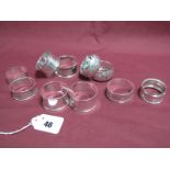 Three Pairs of Hallmarked Silver Napkin Rings, Birmingham 1893, 1923, 1938, together with four