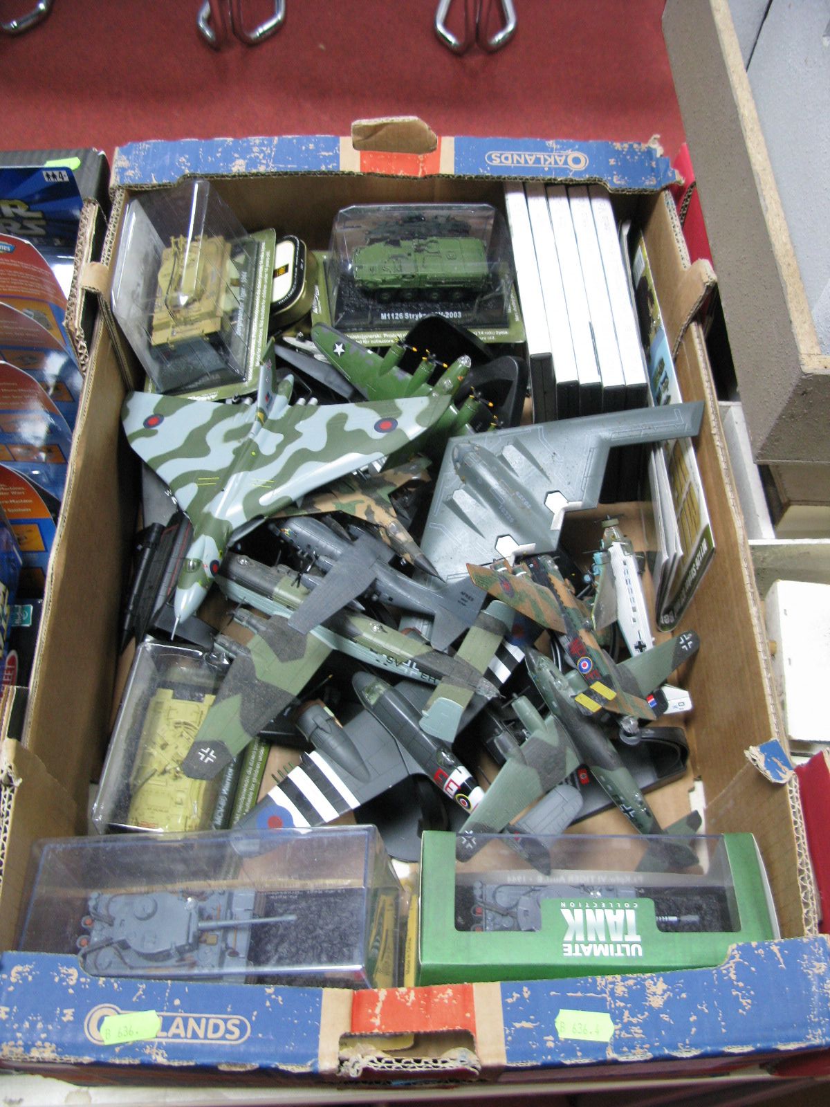 A Quantity of Diecast and Plastic WWII and Later Model Aircraft, with six magazine issued model