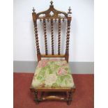 A Late XIX Century Occasional Chair, with shaped top rail and Gothic decoration, barley twist
