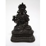 A XIX Century Chinese Bronze Figure of Buddha, seated in contemplative pose, on a shaped stand