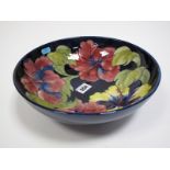 A Moorcroft Pottery Circular Bowl, tube lined and polychrome painted with the Hibiscus pattern,