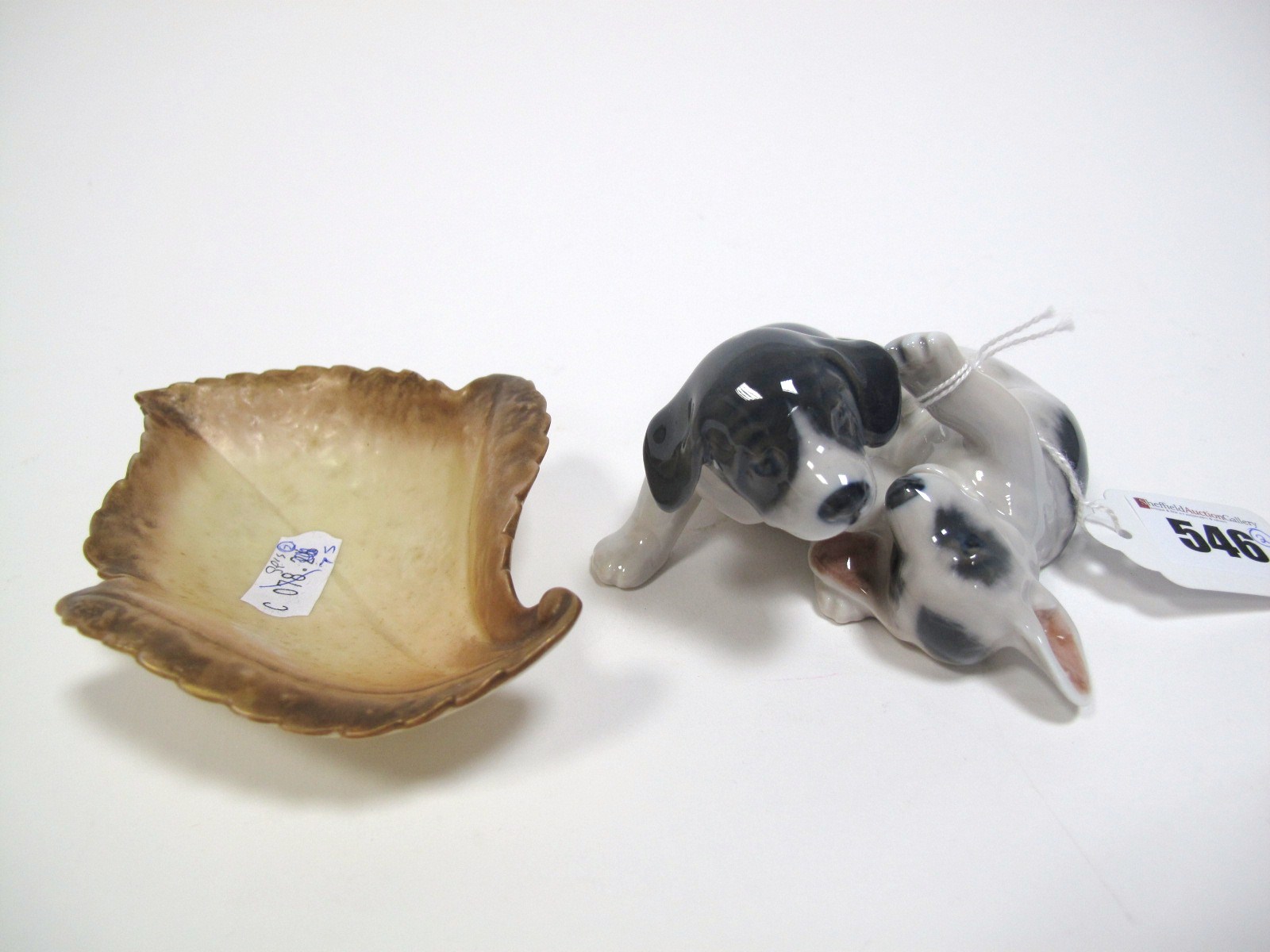 A Royal Copenhagen Porcelain Figure Group Fused Pointer Puppies, No.453, modelled by Erik Nielson,