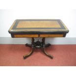 A Mid XIX Century Ebonised Card Table, with a rectangular crossbanded top, baized interior and two