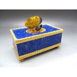 A Modern Reuge Music Singing Bird Box, the mechanical movement contained within an ormolu framed,