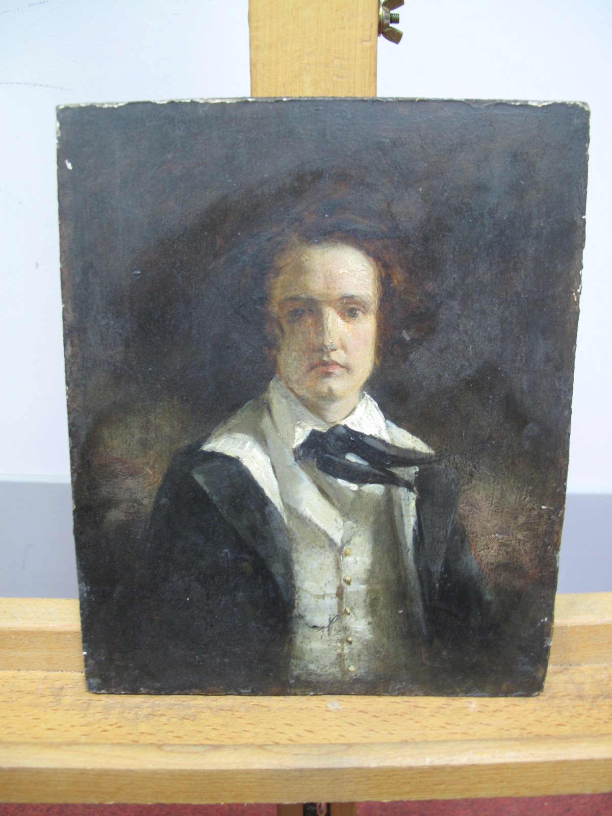 ENGLISH SCHOOL (Early XIX Century)Portrait of a Young Man, standing, half length, oil on panel,22.