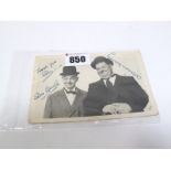 Stan Laurel and Oliver Hardy, a photographic portrait, inscribed in ink, "Thank You, Stan" and