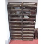 A XIX Century Mahogany Shop Display Cabinet, with sixteen drawers with glass fronts and brass