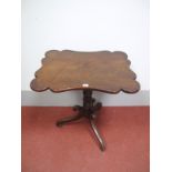 An Early Victorian Tilt Top Occasional Table, shaped rectangular top with roundels to the corners,