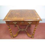 A William and Mary Style Walnut Side Table, the top with a quarter veneered top with feather