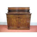 A XIX Century Mahogany Sideboard, with a low back and middle shelf supported by 'S' shaped supports,