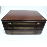 An Early XX Century Mahogany Three Drawer Shop Counter Cabinet, of rectangular form, fitted with cup