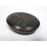 An XVIII Century Pressed Horn Oval Box and Cover, centrally with a coat of arms and motto "Sic