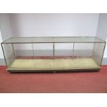 An Early XX Century Mahogany Framed Display Counter, on tapering legs (glass top damaged), 85cms