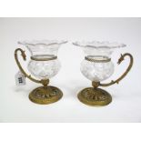 A Pair of Late XIX Century Continental Vases, each with a cut glass body with everted, petalled rim,