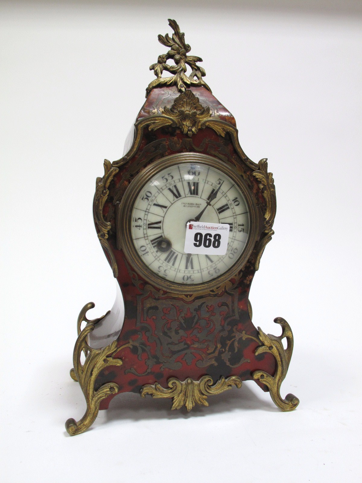 An Early XX Century French Mantel Clock, the brass cylinder movement striking on a gong, with