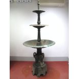 An Early XX Century Cast Iron Three Tier Garden Water Fountain, each dished tier with egg and dart