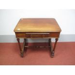A XIX Century Mahogany Sewing Table, with a rectangular top, single drawer with fitted interior,