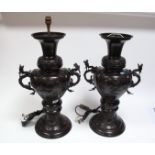 A Pair of Early XX Century Japanese Patinated Bronze Baluster Vases, relief cast with ornamental