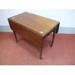 An Early XIX Century Mahogany Pembroke Table, with drop leaves over single drawer and dummy drawer