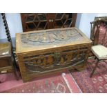 A XX Century Camphor Chest, with deep relief carved decoration of sailing boats on calm waters,