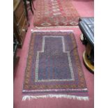 Middle Eastern Short Tassled Rug, circa 1920's, with five central octagonal motifs, three lozenge to