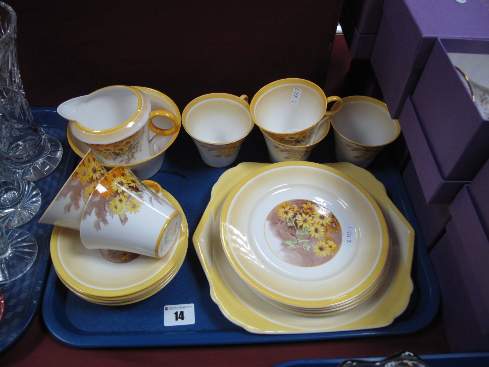 A Shelley Art Deco China Tea Set, decorated with yellow daisies on a banded white ground, pattern
