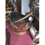 A XIX Century Copper and Brass Helmet Shape Coal Scuttle, (repaired).