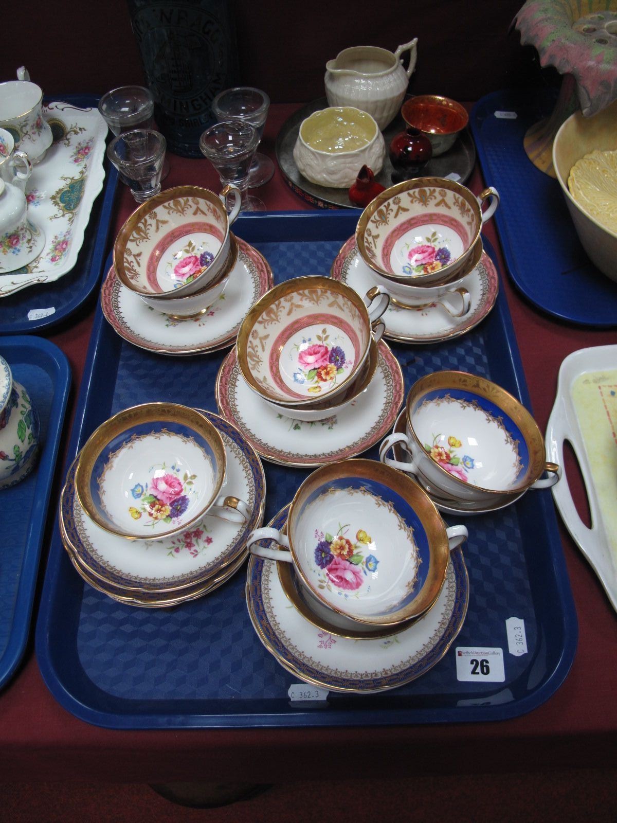 Six Royal Grafton Bone China Cups and saucers, with gilt bands, floral decoration, together with a