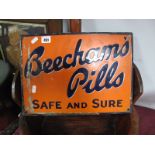 A "Beecham's Pills Safe and Sure" Enamel Sign, in navy blue script on an orange field (with wear),