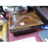 A XIX Century Walnut Tea Caddy, with a sarcophagus top, shaped sides, on bun feet, (ring handle