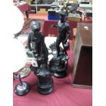 A Pair of Black Painted Early XX Century Spelter Figures, spade carrier and lady with jug, each on