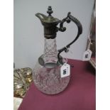 Glass Claret Jug, with faceted neck, etched floral band, plated scroll handle and lid.