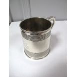 A Hallmarked Silver Mug, SH, London 1812, of tapering cylindrical form, with reeded bands,