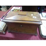 A XIX Century Mahogany Tea Caddy, of sarcophagus form, incurved sides, brass lock, all on carved