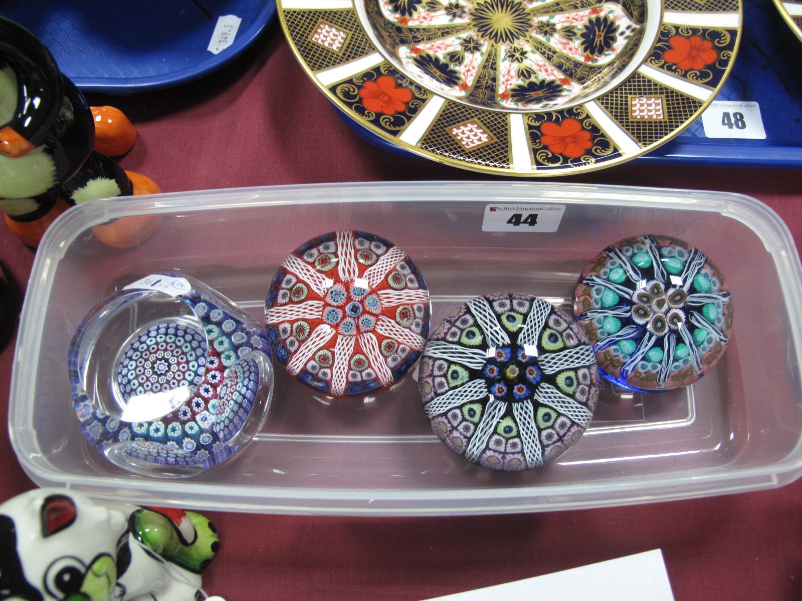 A Whitefriars Faceted Paperweight, with close concentric millefiore canes and date cane for 1974,