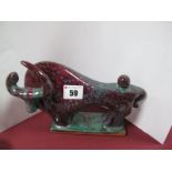 A Stylised Chinese Jun Ware Type Ceramic Bull, hollow cast with deep mottled glaze, 17cms at