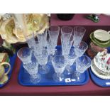 A Set of Eight Waterford Lead Crystal Champagne Flutes, with hobnail cut decoration, faceted
